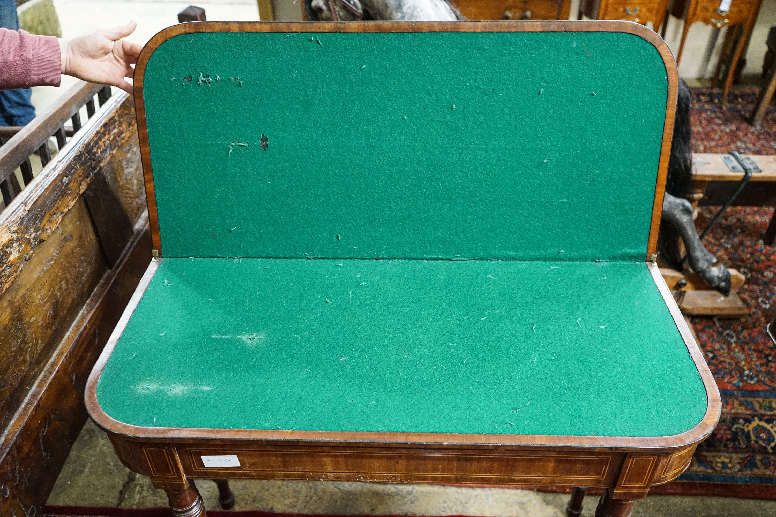 A Regency banded satinwood mahogany folding card table, width 91cm, depth 40cm, height 76cm